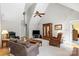 Spacious living room featuring vaulted ceilings, neutral colors, and a cozy seating area at 705 Normandy Rd, Mooresville, NC 28117