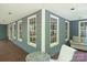 Relaxing porch area with comfortable seating, perfect for enjoying peaceful afternoons at 705 Normandy Rd, Mooresville, NC 28117