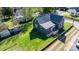 A high angle shot of a gray home with green lawn and detached garage at 71 14Th Se St, Hickory, NC 28602
