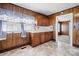 Traditional kitchen features wood cabinets, retro appliances, and vintage-style countertops at 71 14Th Se St, Hickory, NC 28602