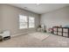 bedroom with a colorful play area, a large window, and soft carpet at 7157 Sumters Camp Trl, Indian Land, SC 29707