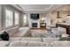 Cozy living room with a fireplace and flat screen TV above the mantel creating a welcoming atmosphere at 7157 Sumters Camp Trl, Indian Land, SC 29707