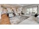 Open concept living room featuring a comfy sectional sofa and contemporary decor at 7157 Sumters Camp Trl, Indian Land, SC 29707