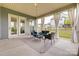 Covered patio with curtains, outdoor furniture, and a view of the backyard at 7157 Sumters Camp Trl, Indian Land, SC 29707