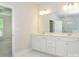 Elegant bathroom with double vanity, marble countertops, large mirror, and a glass-enclosed shower at 7185 Chamberlain Dr, Harrisburg, NC 28075