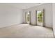 Bedroom featuring natural light from windows, neutral carpet, and molding at 7302 Yellowhorn Trl, Waxhaw, NC 28173