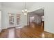 Dining area with a doorway to the back patio at 7302 Yellowhorn Trl, Waxhaw, NC 28173