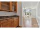 Bright dining room with hardwood floors and a view of the backyard at 7302 Yellowhorn Trl, Waxhaw, NC 28173