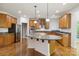 Spacious kitchen with stainless steel appliances and a granite island at 7302 Yellowhorn Trl, Waxhaw, NC 28173