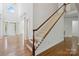 Traditional staircase leading to the upper level at 7302 Yellowhorn Trl, Waxhaw, NC 28173