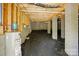Unfinished basement with visible pipes and wooden beams, offering potential for customization at 76 Snyder Ne Ct, Concord, NC 28025