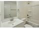 Bright bathroom featuring a vanity and a shower-tub combo, ideal for relaxation and functionality at 76 Snyder Ne Ct, Concord, NC 28025