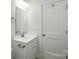 Bathroom with white vanity, mirror, and modern fixtures at 76 Snyder Ne Ct, Concord, NC 28025