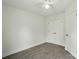 Neutral bedroom with carpet and closet doors, providing a serene and adaptable space at 76 Snyder Ne Ct, Concord, NC 28025