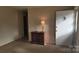 Cozy living room with carpet, features a front door and a large window at 828 Williams St, Gastonia, NC 28052