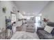 Bright living space featuring an open floor plan, seamlessly connecting the kitchen, dining, and living areas at 833 Generation Ln, Clover, SC 29710