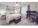 The main bedroom features neutral walls, plush carpet, and a large window with stylish curtains at 833 Generation Ln, Clover, SC 29710