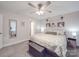 Cozy main bedroom showcasing soft carpet, a plush bed, and abundant natural light at 833 Generation Ln, Clover, SC 29710