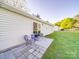 A concrete tiled patio with seating, perfect for enjoying the outdoors at 833 Generation Ln, Clover, SC 29710