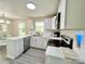 Updated kitchen with stainless steel appliances, white countertops, and modern cabinetry at 903 Lakeview St, Kannapolis, NC 28083