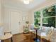 Cozy breakfast nook featuring large windows and access to the outdoors at 908 Academy St, Charlotte, NC 28205