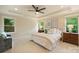 Spacious main bedroom with a tray ceiling and natural light at 908 Academy St, Charlotte, NC 28205