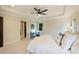 Comfortable bedroom with sitting area, tray ceilings and natural light at 908 Academy St, Charlotte, NC 28205