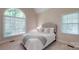 Bedroom with large window and cathedral ceiling provides lots of natural light at 9101 Oak Bluff Ct, Marvin, NC 28173