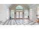 Bright sunroom features tile floors, vaulted ceiling and an abundance of windows at 9101 Oak Bluff Ct, Marvin, NC 28173