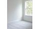 Bright bedroom with neutral walls and carpet and a large window at Tbd Boomer Ct # 1, Statesville, NC 28677