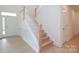 Welcoming foyer with hardwood floors and a staircase with white railing at Tbd Boomer Ct # 1, Statesville, NC 28677