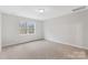 Cozy bedroom with a large window providing natural light at Tbd Boomer Ct # 2, Statesville, NC 28677