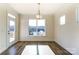 Cozy breakfast area with a view of the backyard and access to the deck at Tbd Boomer Ct # 3, Statesville, NC 28677