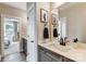 Modern bathroom with double vanity, quartz countertops, and decorative mirrors at Tbd Boomer Ct # 5, Statesville, NC 28677