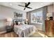 Cozy bedroom with a large window, stylish decor, and comfortable furnishings at Tbd Boomer Ct # 5, Statesville, NC 28677