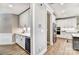 Gourmet kitchen with a wine cooler, stainless steel appliances, and custom cabinetry at Tbd Boomer Ct # 5, Statesville, NC 28677
