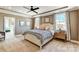 Relaxing main bedroom with tray ceiling, large windows and cozy decorative pillows at Tbd Boomer Ct # 5, Statesville, NC 28677