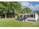 Charming single-Gathering home with a well-maintained lawn and a welcoming front porch at 103 Moore Ave, Mount Holly, NC 28120