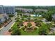 Aerial view showcasing the beautiful community grounds with lush landscaping and a sparkling swimming pool at 11544 Costigan Ln # 8306, Charlotte, NC 28277