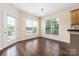 Dining area featuring hardwood floors and natural light at 11544 Costigan Ln # 8306, Charlotte, NC 28277