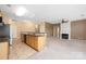 Spacious kitchen opens to living area; featuring granite countertops, stainless steel appliances, and tile floors at 11544 Costigan Ln # 8306, Charlotte, NC 28277