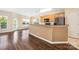 Kitchen area featuring a bar, stainless steel appliances and plenty of natural light at 11544 Costigan Ln # 8306, Charlotte, NC 28277