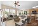 Bright living room featuring large windows, neutral tones, and an open concept design at 11544 Costigan Ln # 8306, Charlotte, NC 28277