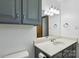 Bathroom featuring a single sink vanity, light fixture and a mirror at 119 Legacy Ln, Harmony, NC 28634