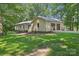 Charming single-story home with well-maintained lawn and landscaping, featuring a two-car garage at 119 Legacy Ln, Harmony, NC 28634
