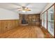 Inviting living room with wood-burning fireplace, built-in shelves, and natural light at 119 Legacy Ln, Harmony, NC 28634