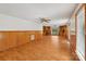 Spacious living room with wood floors and built-in shelves at 119 Legacy Ln, Harmony, NC 28634