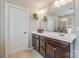 Elegant bathroom features a double sink vanity, large mirror, and a separate shower at 1226 Clingman Dr, Fort Mill, SC 29715