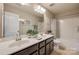Bathroom featuring a double sink vanity and a shower-tub combination at 1226 Clingman Dr, Fort Mill, SC 29715