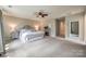 Large bedroom with fireplace and large windows at 1226 Clingman Dr, Fort Mill, SC 29715